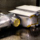 Illustration for article titled A Shiny Space Suitcase Will Tell Us If Theres Water on Asteroid Bennu